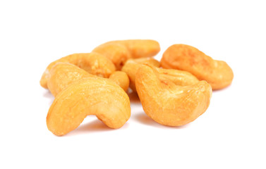 Pile of roasted cashew nuts. Group of cashewl nuts. Nust isolated on white background