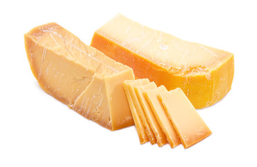 Two partly sliced pieces of Dutch hard cheese Beemster