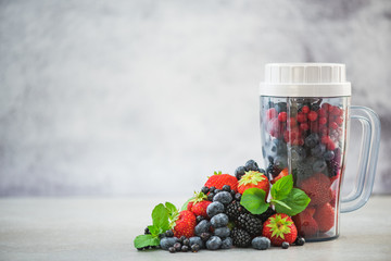 Blender full of berry fruits