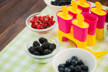 Summer popsicles home made from berry fruits