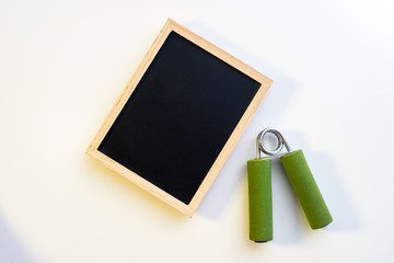 Fitness Concept & Empty Blackboard - Fitness concept. Top down view.