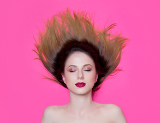 Above view at young redhead woman