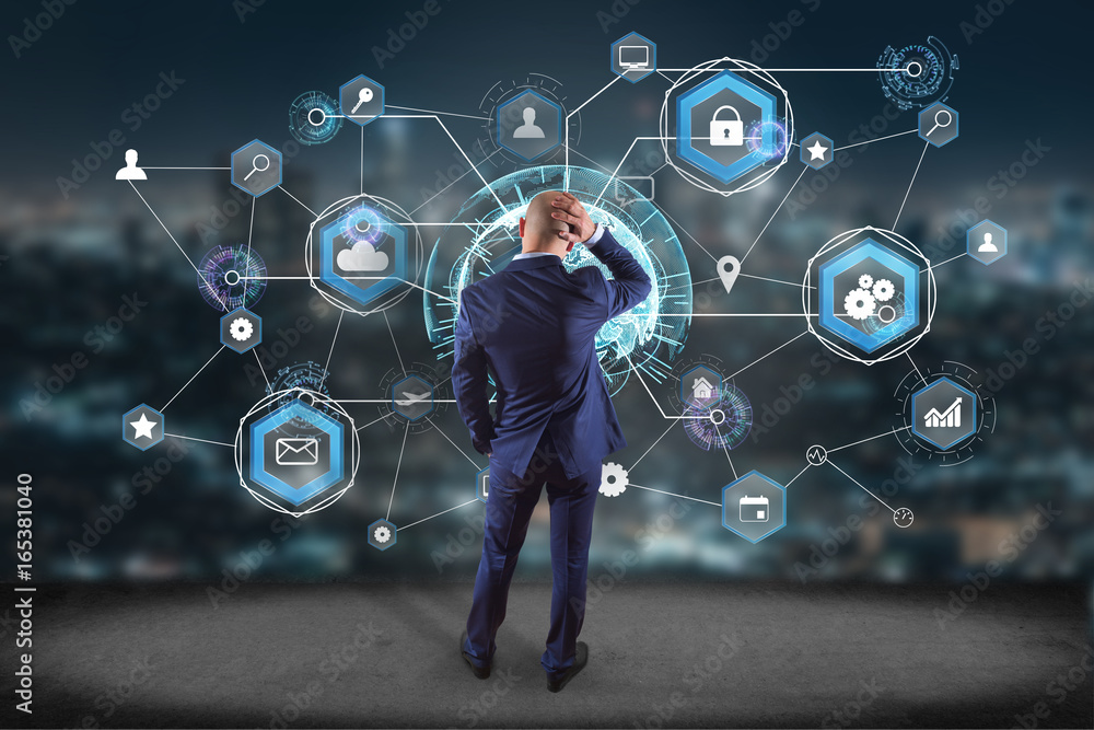 Poster businessman in front of a wall with an international business network connection displayed on a futu