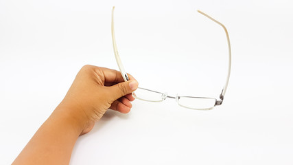 Man hand hold the smart eye glasses in white  plastic leg and black pattern