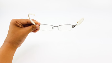 Man hand hold the smart eye glasses in white  plastic leg and black pattern