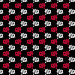 White  and red roses  pattern on black background.