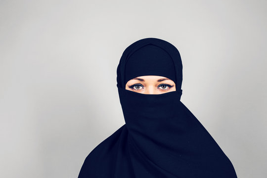 Young muslim woman wearing niqab