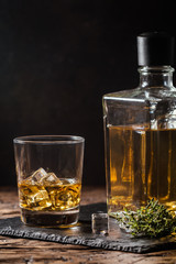 Whiskey with ice in glasses