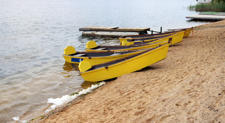 Wooden yellow aged used boats