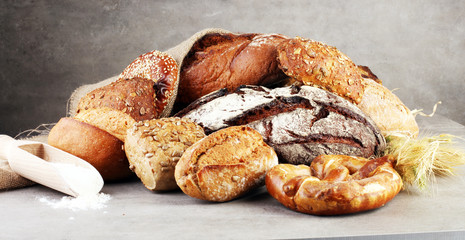 Freshly baked bread. Different kinds of bread and bread rolls on