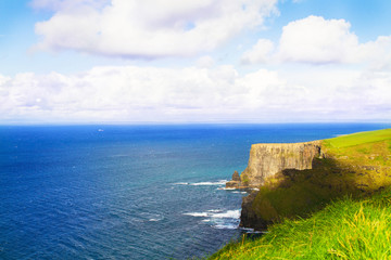 Fototapeta na wymiar Cliffs of Moher, west coast of Ireland, County Clare at wild atlantic ocean