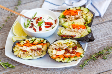 Vegan onigirazu with tofu and vegetables. Healthy vegan dinner concept.