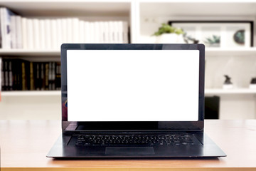 Fototapeta premium Laptop computer with blank screen on table
