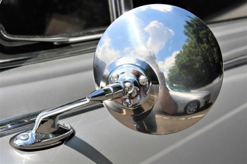 An image of a vintage car mirror