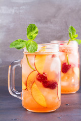 Raspberry Peach Lemonade. Fruit and berry cocktail