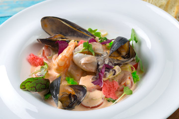 Tasty seafood on plate on table close-up