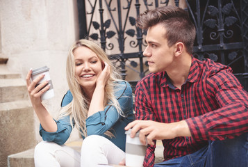Heterosexual couple of students during break