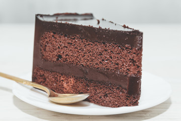 Chocolate cake on wooden table