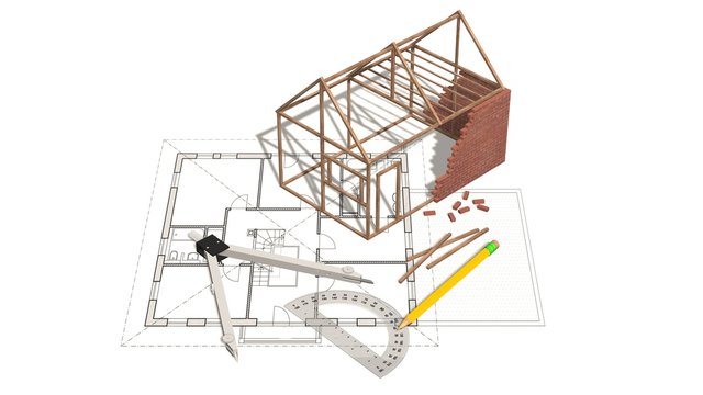House project - house under construction on blueprint - concept for construction industry