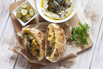 Jerusalem mixed grill or Meorav Yerushalmi. Grilled meat dish. It consists of chicken hearts, spleens and liver mixed with bits of lamb cooked on a flat grill. Israeli cuisine. 