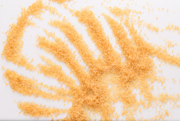 cane sugar unrefined, dry demerara isolated on the white background