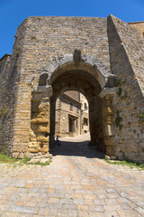 Porta all' Arco, one of city's gateways, is the most famous Etruscan architectural monument in Volterra, Italy