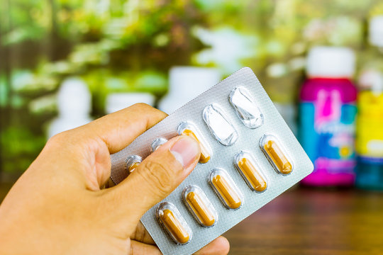 Drug prescription for treatment medication. Pharmaceutical medicament, cure in container for health. Pharmacy theme, capsule pills with medicine antibiotic in packages.