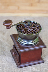 Coffee grinder full of roasted coffee beans - from the top