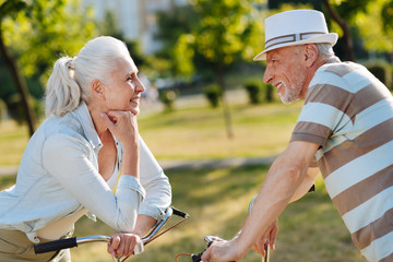 Two loving elderly people looking at each other