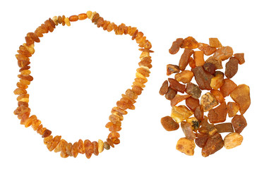 Obraz premium Handful of raw amber and necklace made of it