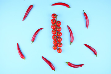 Chili with vegetables on blue background