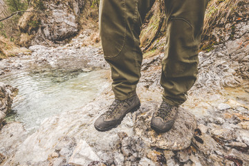 exploring the little creek - outdoor activity italian Alps - vintage filter