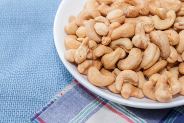 stack of Cashews on bowl