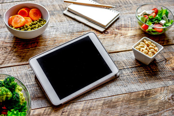 concept diet and tablet with vegetables mock up