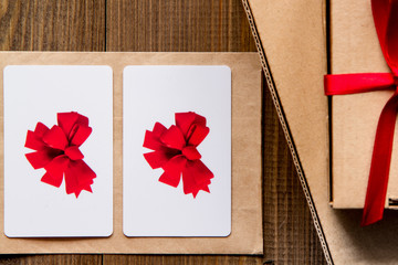 concept of gift cards on wooden background top view