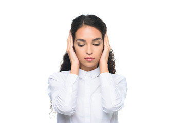 attractive businesswoman in white shirt with closed eyes closing ears with hands, isolated on white