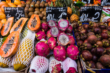 Colourful fresh fruit and vegetables on display in street market