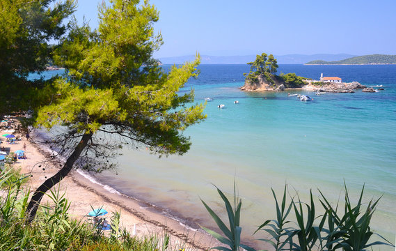 Beautiful view on small island with church Agios Nikolaos near Ellinika beach, Euboea- Greece
