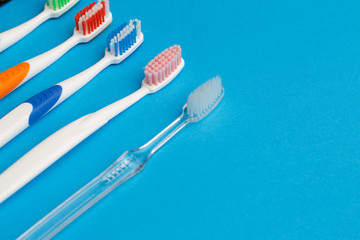 Colored toothbrushes , place for inscription