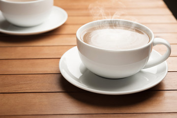 Coffee cup couple on wood table in cafe aroma fresh life style