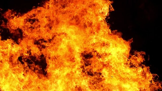 Close-up of of movement of the flames of a bonfire.Slow Motion.