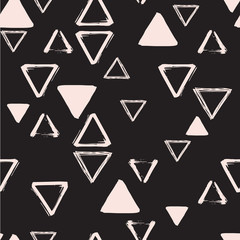 Seamless geometric ornament from handdrawn triangles. Can be used for fabrics and backgrounds