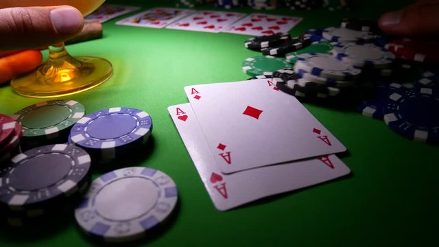 Double Aces With Poker Chips. Winner In Poker. Royal Flush. Cigar and Glass with Brandy On The Table With Poker Chips. Poker Chips For Gambling Card Game. Poker Win Combination