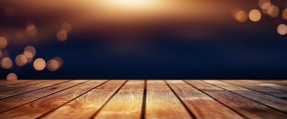 Christmas bokeh background with wooden table