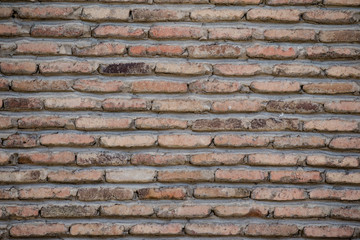 Brick wall of old bricks