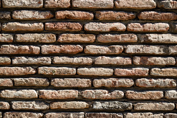 Brick wall of old bricks