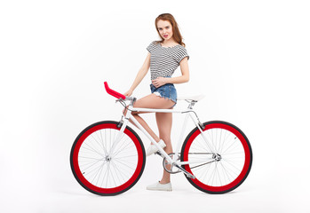 Fototapeta na wymiar Woman posing with bicycles