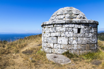 The Facho of Donon, an ancient stone lighthouse for guiding sailors in Monte do Facho, Cangas,...