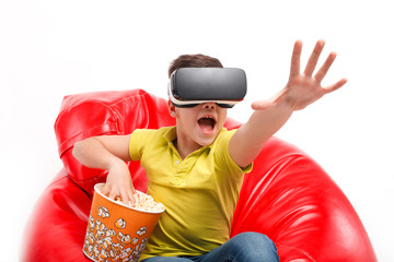 Kid in VR headset with popcorn