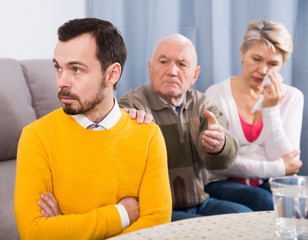 Grandfather instructs grandson